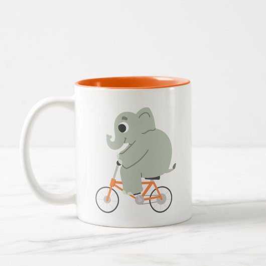 Tasse 2 Couleurs Petit éléphant sur un vélo (Gauche)