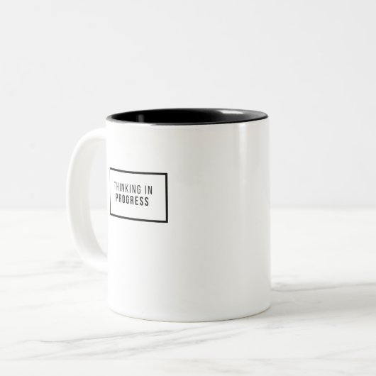 TASSE 2 COULEURS RÉFLEXION EN PROGRÈS (Devant gauche)