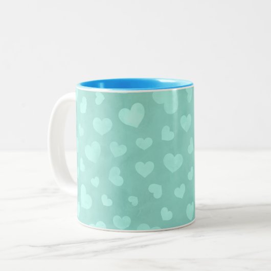 Tasse 2 Couleurs Vert aux coeurs blancs & muqueuse d'intérieur bleu (Devant gauche)