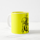 Tasse 2 Couleurs Violoncelle plays ruisseau (Devant gauche)