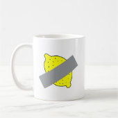 Tasse à café avec citron jaune scotché (Gauche)