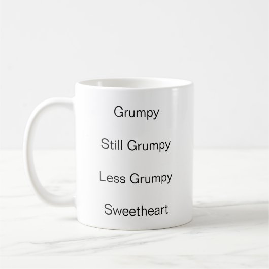 Tasse à café d'attitude. (Gauche)