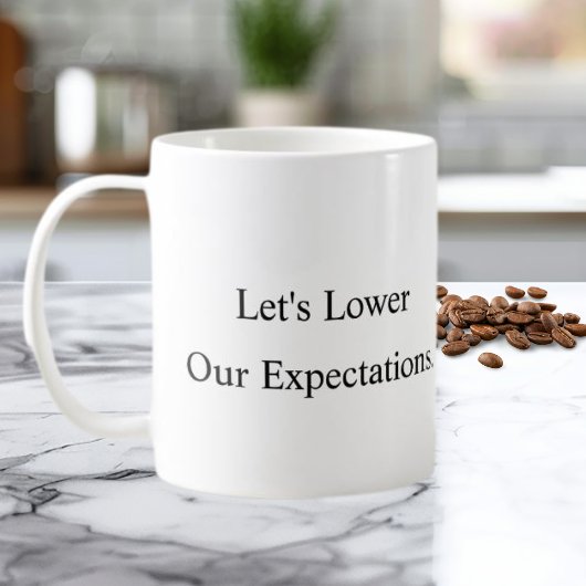 Tasse à café « Réduisons nos attentes »
