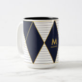 Tasse à deux tons de bleu marine d'or de (Devant gauche)