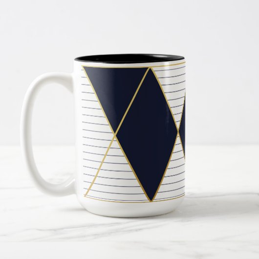 Tasse à deux tons de bleu marine d'or de (Gauche)