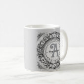 Tasse à monogramme orné argent (Devant droit)
