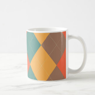 Tasse à motifs de losanges orange bleue lumineuse