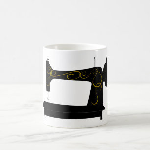 Tasse antique de machine à coudre