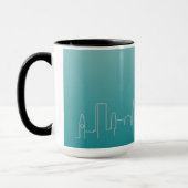 Tasse argentée de sonnerie d'horizon de ville de (Gauche)