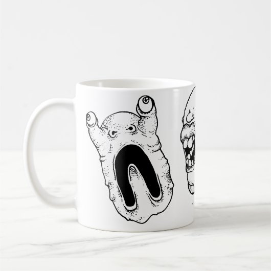 Tasse avec de visages tordus étranges (Gauche)