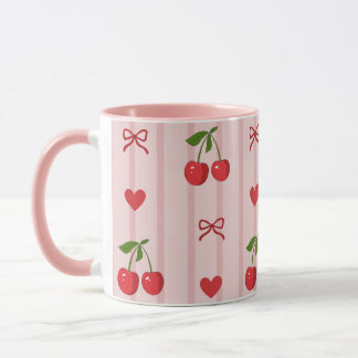 Tasse avec des rubans rouges et des cerises