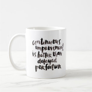 Tasse blanche classique "continue d'amélioration