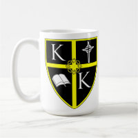 Tasse blanche classique de bouclier