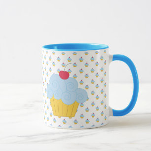 Tasse bleue de petit gâteau