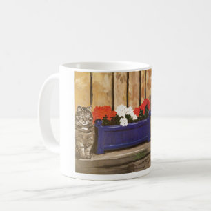 Tasse comportant la boîte de chat et de fleur