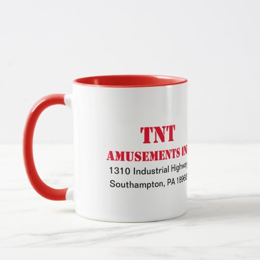 Tasse d'amusements de TNT (Gauche)