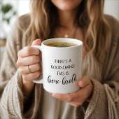 Tasse de bouillon d'os avec une bonne chance