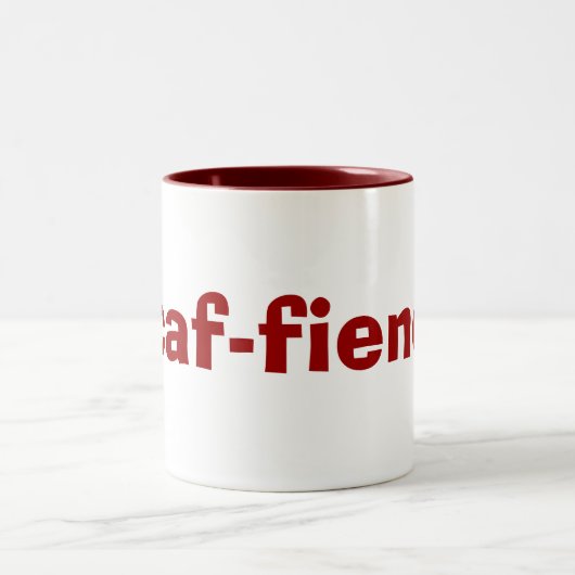 tasse de CAF-démon pour des intoxiqués de café et (Centre)