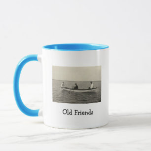 Tasse de café avec ancienne photo de voileurs Amis