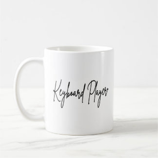 Tasse de café avec écriture noire Joueur de clavie