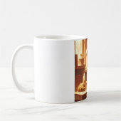 Tasse de café avec un chat lisant confortablement (Gauche)