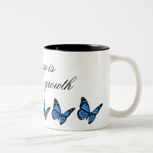 Tasse de café bleue de papillon