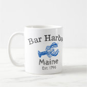 Tasse de café bleue du "Maine de port de barre" de (Gauche)