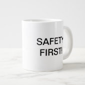 Tasse de café de "sécurité première" de Dan de (Devant droit)
