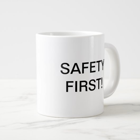 Tasse de café de "sécurité première" de Dan de (Devant droit)