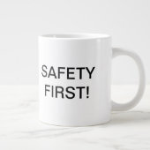 Tasse de café de "sécurité première" de Dan de (Droite)