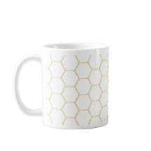Tasse de café d'or de nid d'abeilles