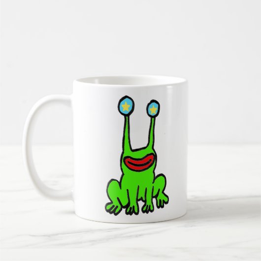 Tasse de café étrangère heureuse de grenouille (Gauche)