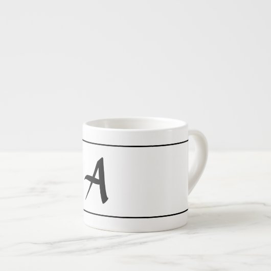 Tasse de CAFÉ EXPRESS AVEC l'INITIALE de (Devant droit)