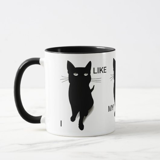 Tasse de café fraîche de chat noir par des (Gauche)