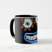 Tasse de café noire avec visage de monstre effraya (Devant gauche)