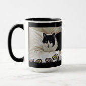 Tasse de café noire et blanche précieuse de Milo (Gauche)