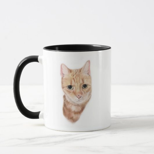 Tasse de chat de gingembre (Gauche)