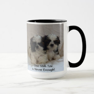 Tasse de chiot de deux Shih Tzu