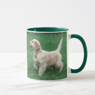 Tasse de chiot de golden retriever