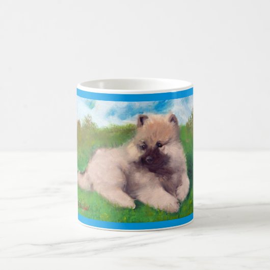Tasse de chiot de Keeshond de "Havel" (Centre)