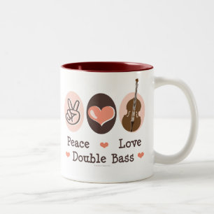 Tasse de double basse d'amour de paix