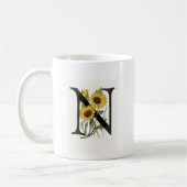 Tasse de la marguerite N de monogramme (Gauche)