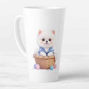 Tasse de Latte avec un chiot mignon dans un panier