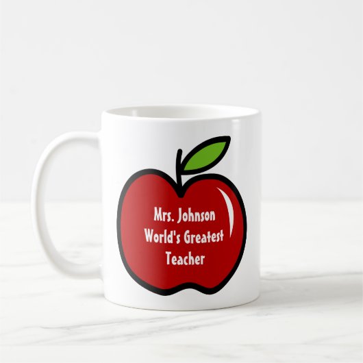 Tasse de l'enseignant avec pomme rouge | Conceptio (Gauche)