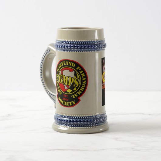 Tasse de logo de boule de crâne de GMPs (Devant gauche)