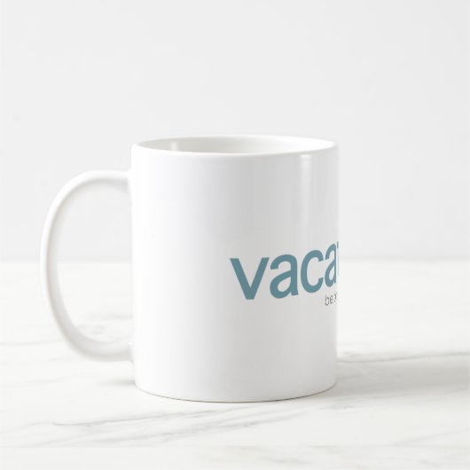Tasse de logo de Vcom (Gauche)