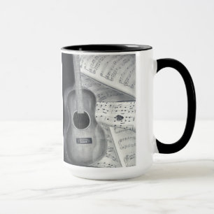 Tasse de musique de guitare et de feuille