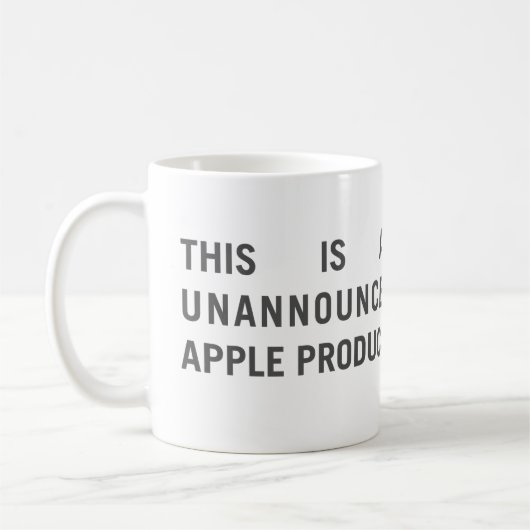 Tasse "de produit d'Unnanounced Apple" (Gauche)