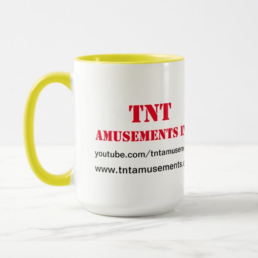 Tasse de site Web d'amusements de TNT (Gauche)