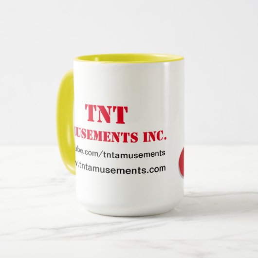 Tasse de site Web d'amusements de TNT (Devant gauche)